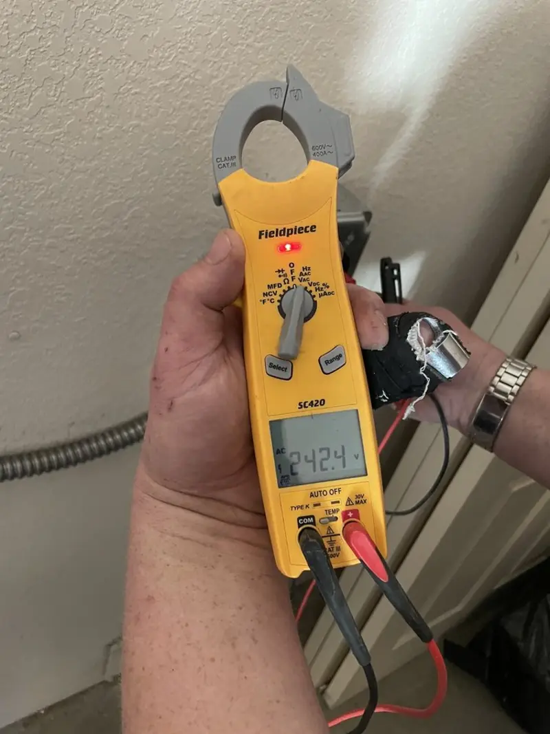 Voltage testing with clamp meter during Aluminum Wiring Replacement in Poolesville